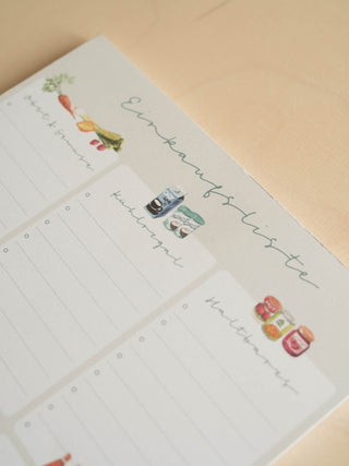 Shopping list pad with compartments